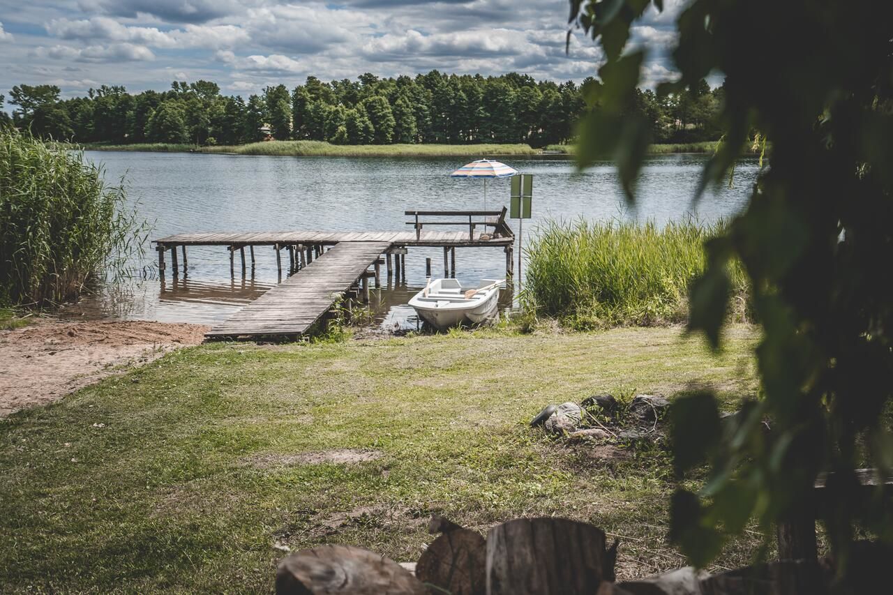 Дома для отпуска Dom z sadem nad jeziorem Orzysz Skomack Wielki-33