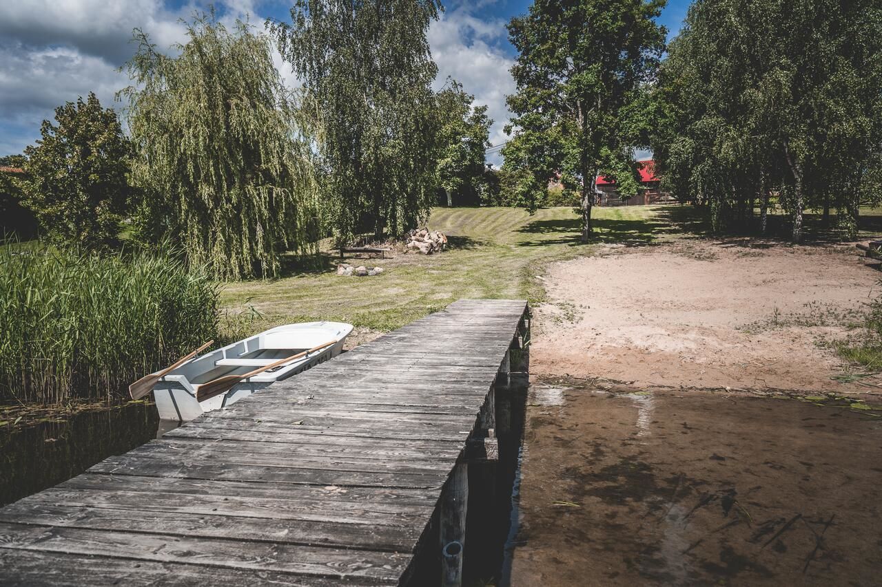 Дома для отпуска Dom z sadem nad jeziorem Orzysz Skomack Wielki-35
