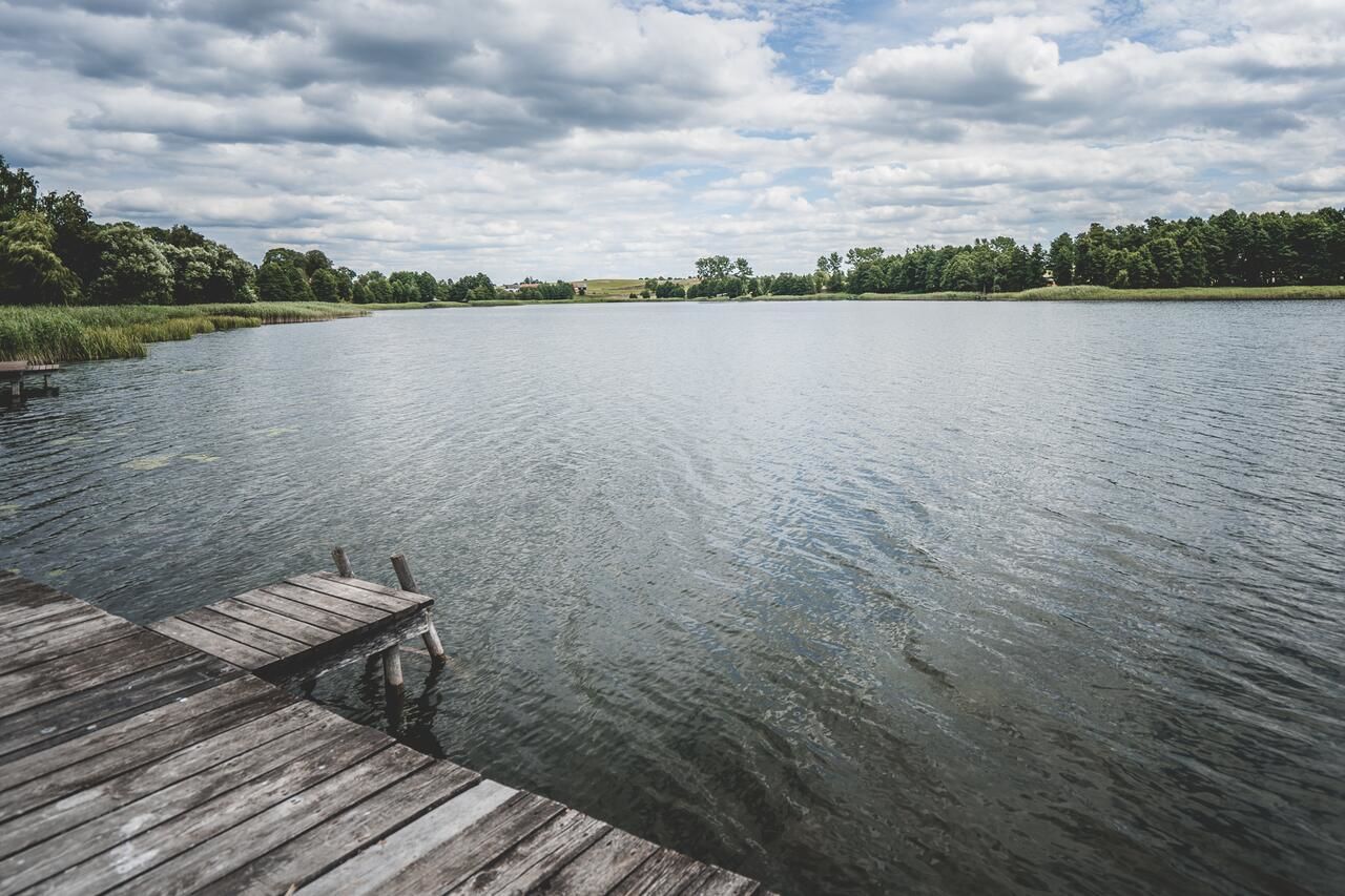 Дома для отпуска Dom z sadem nad jeziorem Orzysz Skomack Wielki-36