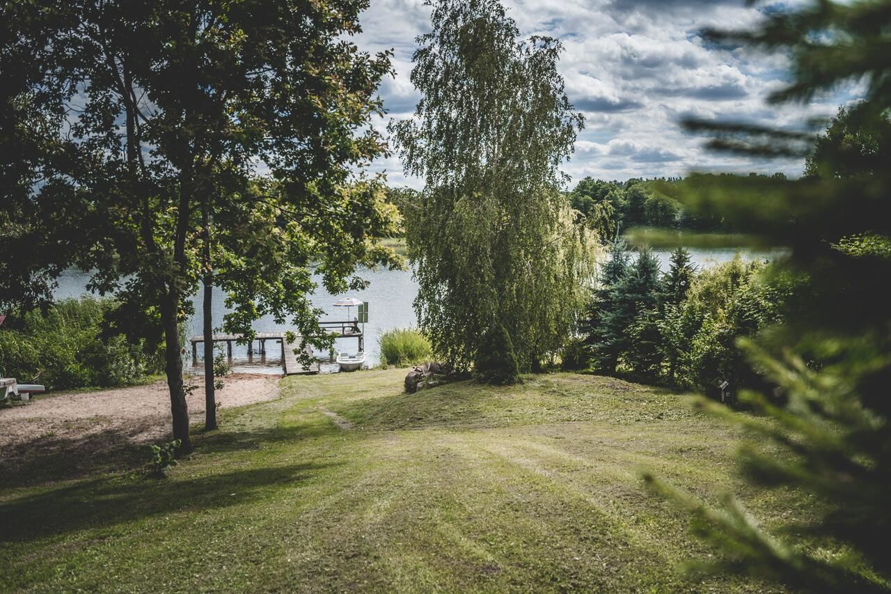 Дома для отпуска Dom z sadem nad jeziorem Orzysz Skomack Wielki-46