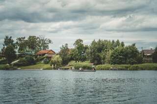 Дома для отпуска Dom z sadem nad jeziorem Orzysz Skomack Wielki Дом с 3 спальнями-46