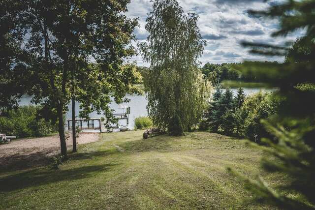 Дома для отпуска Dom z sadem nad jeziorem Orzysz Skomack Wielki-45